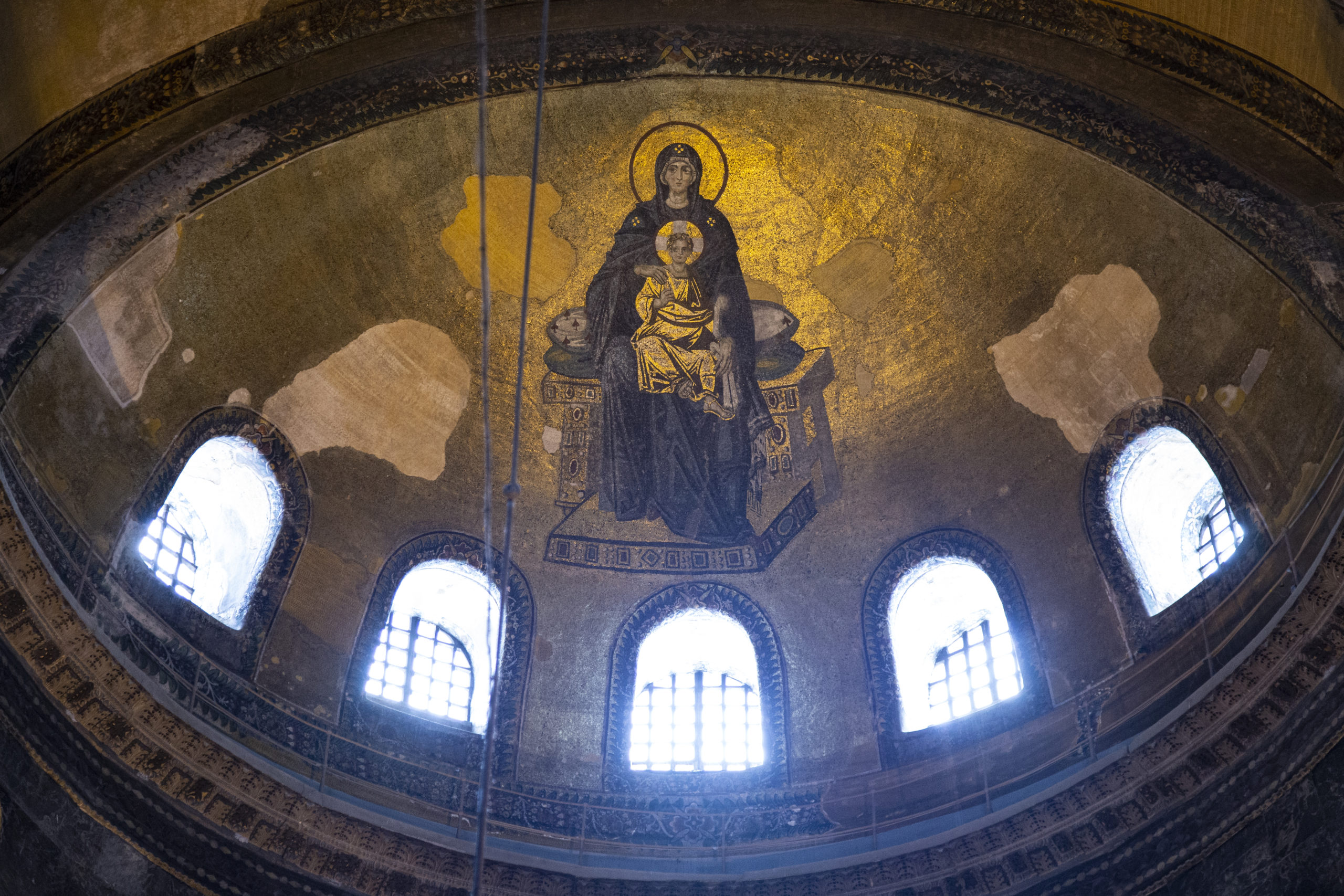 Young beautiful eastern-mediterrenean woman in black byzantine