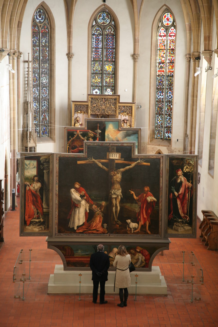 Matthias Grünewald, Isenheim Altarpiece, view in the chapel of the Hospital of Saint Anthony, Isenheim, c. 1510–15, oil on wood, 9' 9 1/2" x 10' 9" (center panel) (Unterlinden Museum, Colmar, France) 