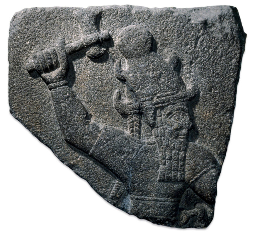 Image caption: Basalt relief showing a storm-god Neo-Hittite, 10th century BC. From Carchemish, south-east Anatolia (modern Turkey) (© The Trustees of the British Museum)