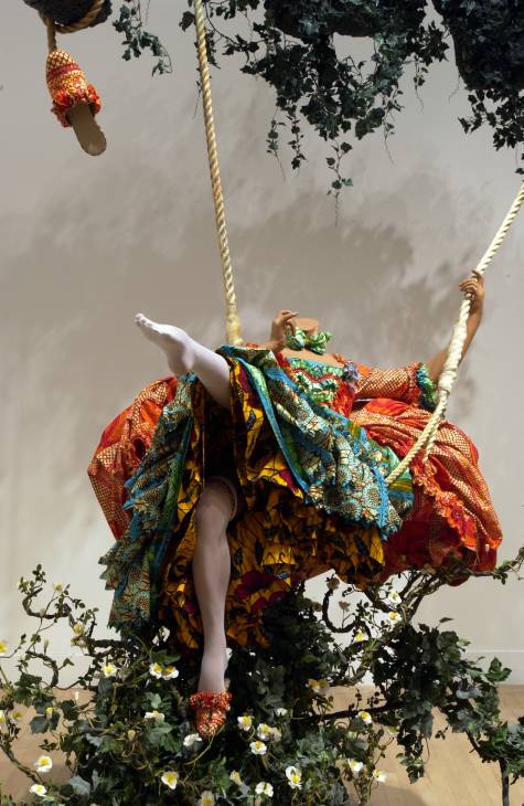 Yinka Shonibare CBE, The Swing (after Fragonard), 2001, mannequin, cotton costume, 2 slippers, swing seat, 2 ropes, oak twig and artificial foliage, 330 x 350 x 220 cm (Tate, London) © Yinka Shonibare