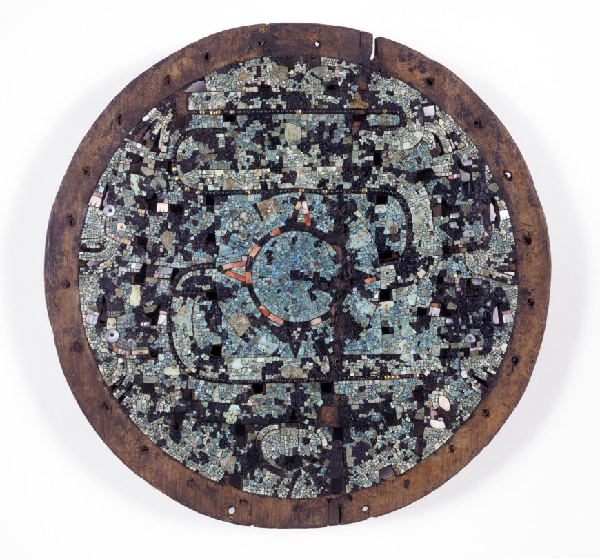 Wooden ceremonial shield with mosaic inlay, Mexica/Mixtec, 15th-16th century, from Mexico, 31.6 cm in diameter (© Trustees of the British Museum)