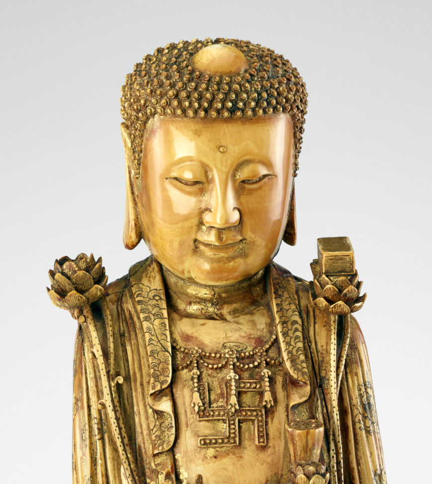 Possibly Bodhisattva Avalokiteshvara (Guanyin) in the guise of a Buddha, late Ming or early Qing dynasty, 17th-18th century, ivory (fossil mammoth ivory) with traces of gilding, ink, and lacquer, China, 45.7 x 13 cm (Freer Gallery of Art, Smithsonian Institution, Washington, DC: Purchase — Charles Lang Freer Endowment, F1957.25a-b)