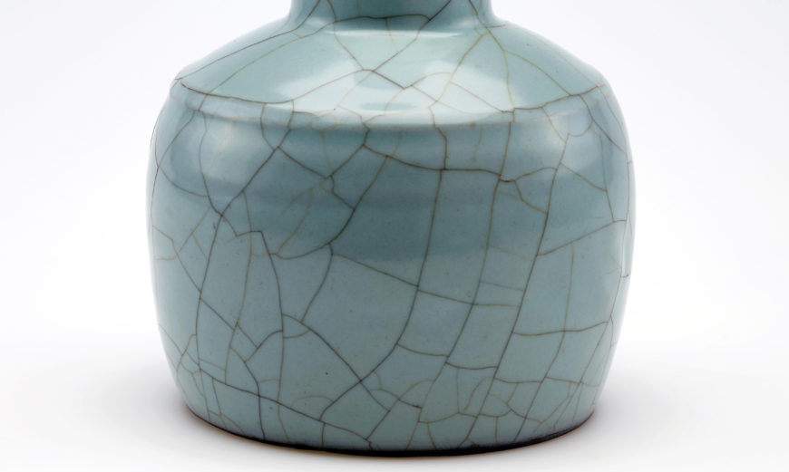 Guan ware long-necked vase with raised bow-string decoration, Southern Song dynasty, 12th century, Guan ware, stoneware with Guan glaze, China, Zhejiang Province, Hangzhou, Jiaotanxia kiln, 23.2 x 14.1 cm (Freer Gallery of Art, Smithsonian Institution, Washington, DC: Gift of Charles Lang Freer, F1911.338)