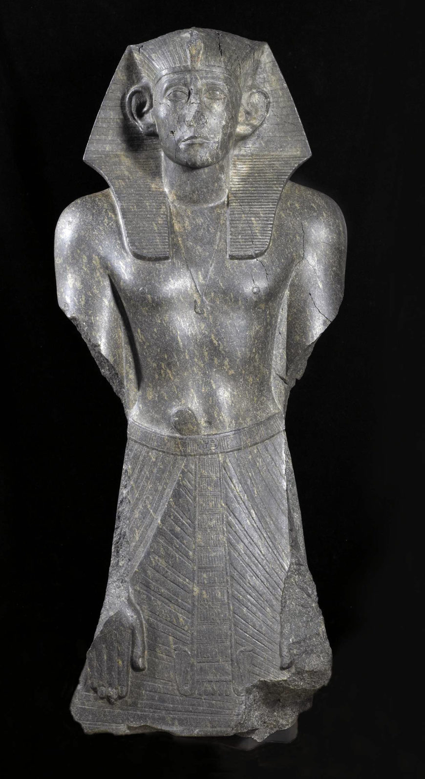 Statue of Senwosret III (Senusret III), c. 1850 B.C.E., 12th Dynasty, ancient Egypt, incised granite, found at the Temple of Mentuhotep, 122 cm high (© Trustees of the British Museum)