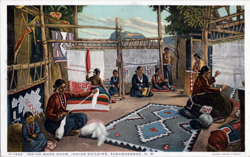 " Indian work room, Indian Building, Albuquerque, New Mexico. Navaho Indians among them Elle, the most famous weaver among the Navahos, and Tom of Ganado, her husband, and Indians from other tribes - Santo Domingo, Isleta, Laguna, and San Felipi," Fred Harvey series, c. 1900–09 (Newberry Library)