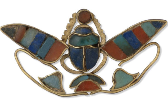 Scarab pendant, 1897–1878 B.C.E., 12th Dynasty, made under Senusret II, ancient Egypt, electrum, lapis lazuli, cornelian, and feldspar, 3.5 cm across for the wing span (© Trustees of the British Museum)