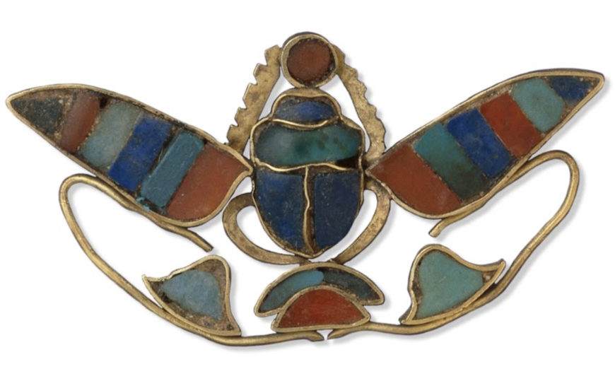 Scarab pendant, 1897–1878 B.C.E., 12th Dynasty, made under Senusret II, ancient Egypt, electrum, lapis lazuli, cornelian, and feldspar, 3.5 cm across for the wing span (© Trustees of the British Museum)