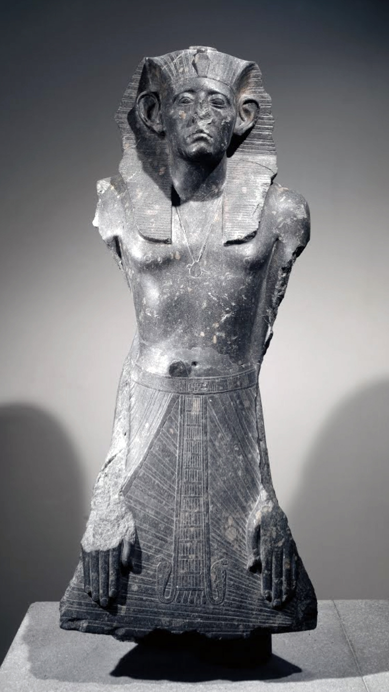 statue of Senwosret III (Senusret III), 1874–1855 B.C.E., 12th Dynasty, ancient Egypt, incised granite, found at the Temple of Mentuhotep, 122 cm high (© Trustees of the British Museum)