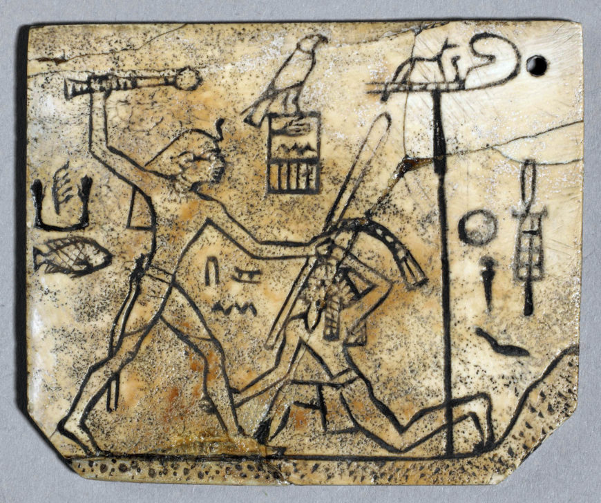 King Den's sandal label, 1st dynasty, ivory, found at Abydos, Upper Egypt, 4.5 x 5.3 cm (© Trustees of the British Museum)