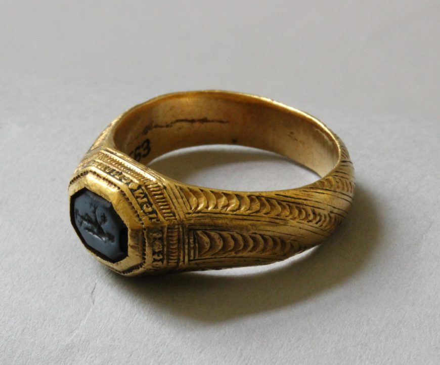 Signet-ring with an intaglio depicting <em>Bonus Eventus</em>, inscribed with a cross and an excerpt from Psalm 27.1 in Greek: “The Lord is my light and my salvation; whom shall I fear?” late Byzantine, 14th century, Constantinople (Istanbul), gold and nicolo, diam. 2.8 cm (photo: <a href="https://www.britishmuseum.org/collection/image/1523907001">The British Museum</a>, CC BY-NC-SA 4.0)