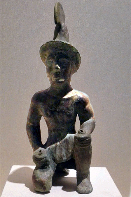 Figure of a kneeling warrior from Künäs river,Xinjiang,bronze,height40 Xinjiang Institute of Archaeology