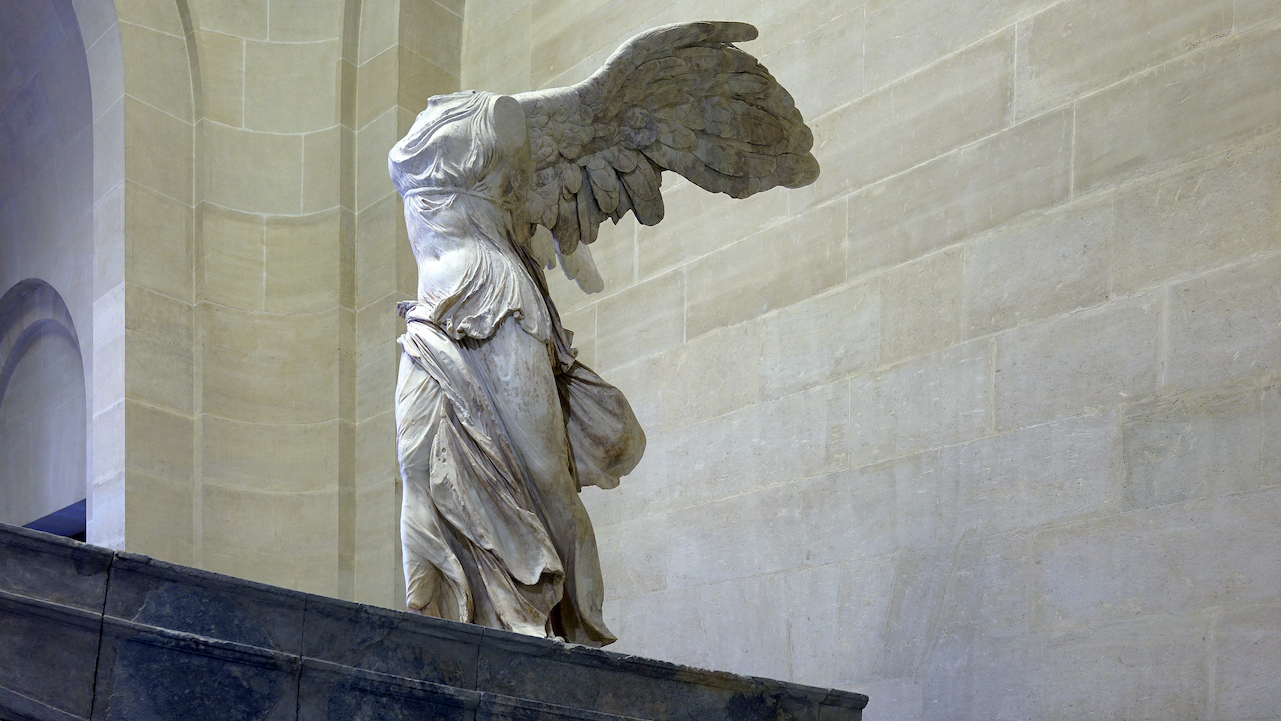 Nike of Samothrace (winged Victory), Lartos marble (ship), Parian marble (figure), c. 190 B.C.E., 3.28 meters high (Louvre, Paris; photo: Steven Zucker, CC BY-NC-SA 2.0))