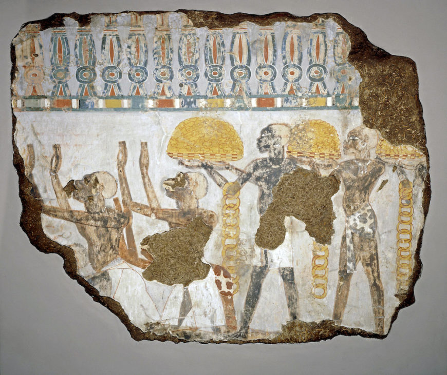 Part of tomb wall; plaster on mud; painted representation of Nubians offering gold nuggets and rings to king(not seen). Wall-painting, probably from the tomb of Sobekhotep, Thebes, c. 1400 B.C.E., New Kingdom, reign of Thutmose IV, painted stucco, 60 x 58.5 (© Trustees of the British Museum)