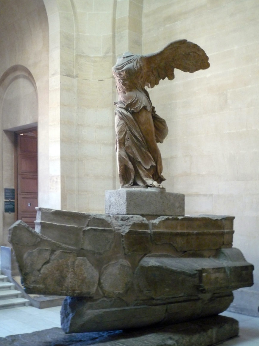 Nike of Samothrace (winged Victory), Lartos marble (ship), Parian marble (figure), c. 190 B.C.E., 3.28 meters high (Louvre, Paris; photo: Steven Zucker, CC BY-NC-SA 2.0))