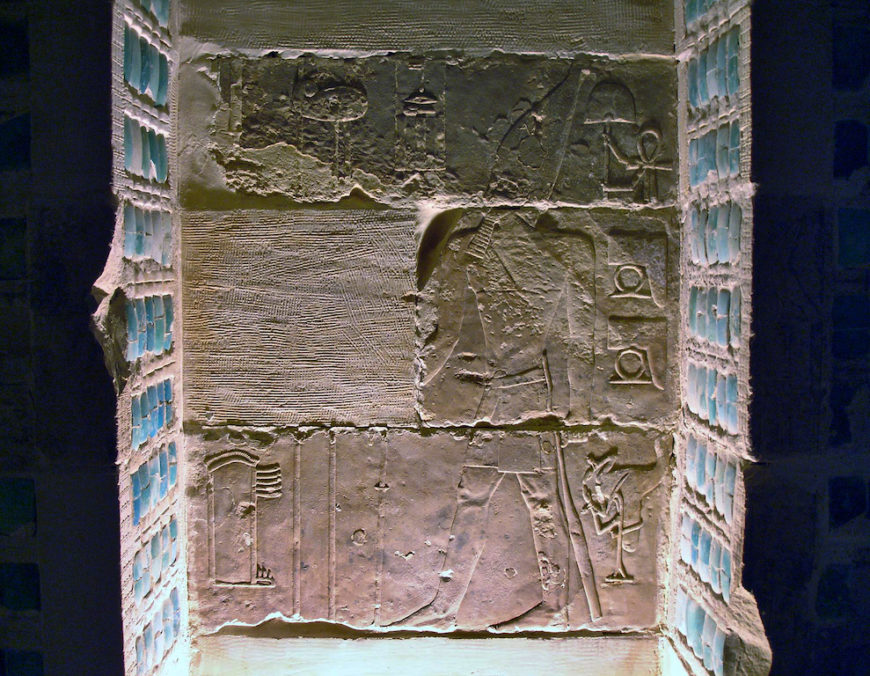 Niche with panel showing Djoser walking towards the shrine of Horus of Behedet (modern Edfu), Stepped Pyramid complex, Saqqara, Egypt (photo: Juan R. Lazaro, CC BY 2.0)