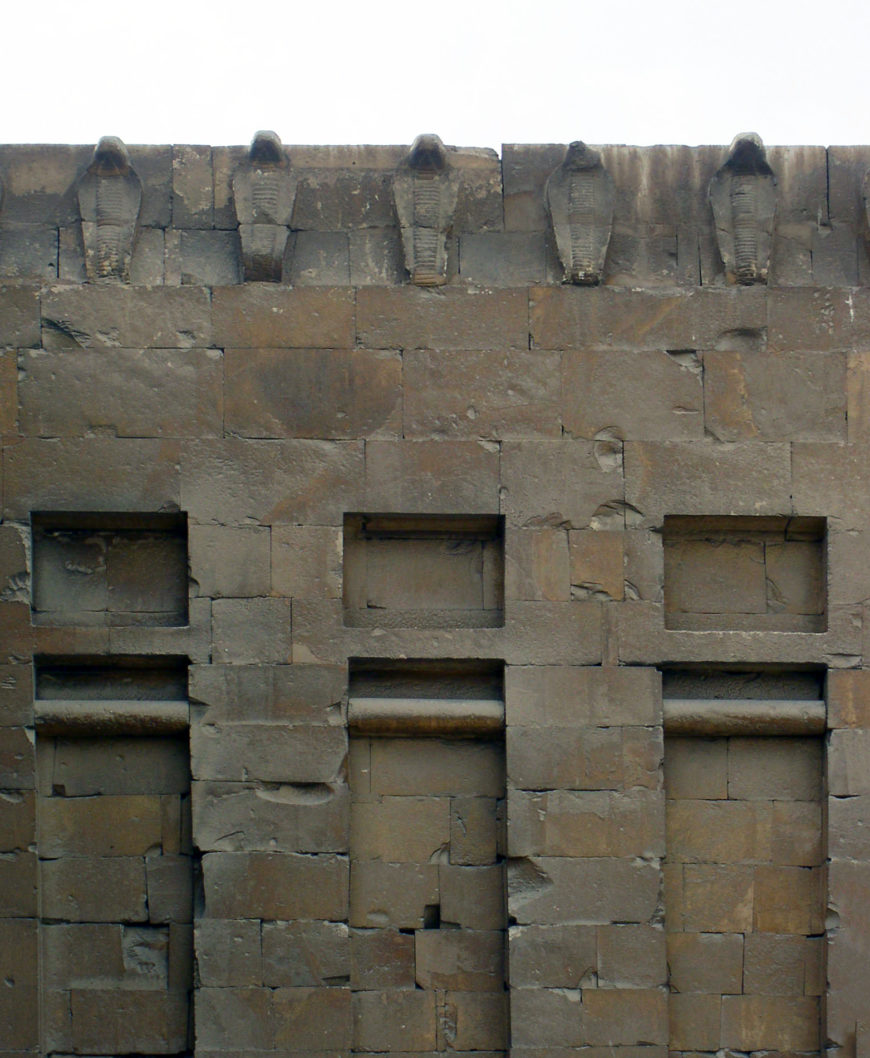 Frieze of uraei on the South Tomb, Stepped Pyramid complex, Saqqara, Egypt (photo: Dr. Amy Calvert)
