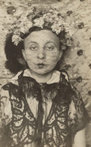 Gertrud Arndt, Untitled (Masked Self-Portrait, Dessau), 1930, gelatinous silver print, 22.9 x 14.3 cm (MoMA)