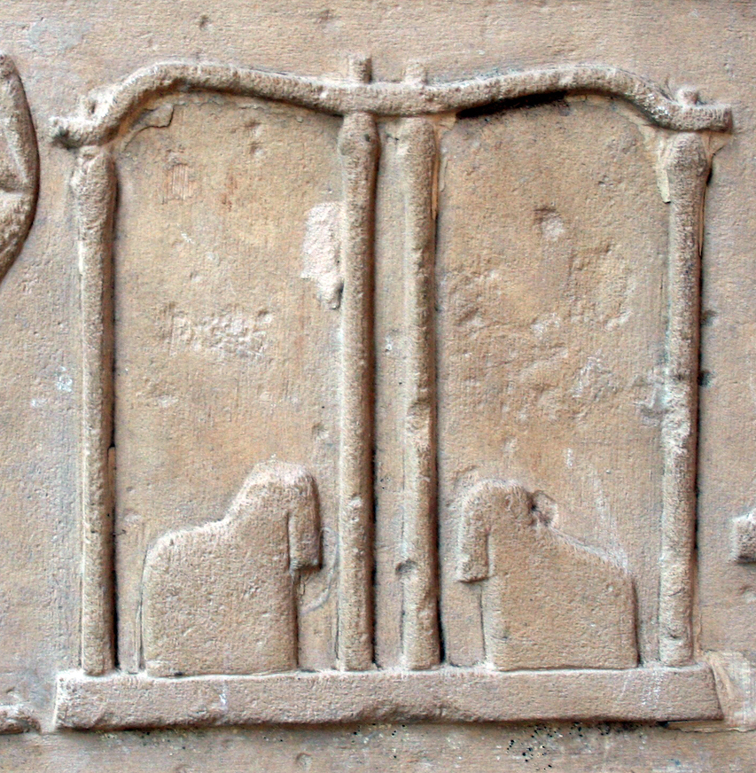 Hieroglyph for Heb-Sed, showing the dual thrones on a platform enclosed by a kiosk, from the White Chapel, Middle Kingdom
