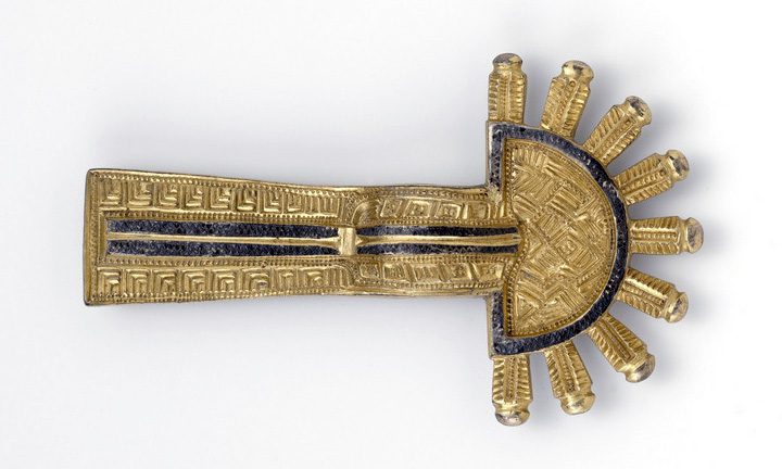 Lombard silver bow fibula, gilded, with inlaid niello and engraved decoration, mid 6th century C.E., found in Kranj,  11.3 cm. long (National Museum, Slovenia)