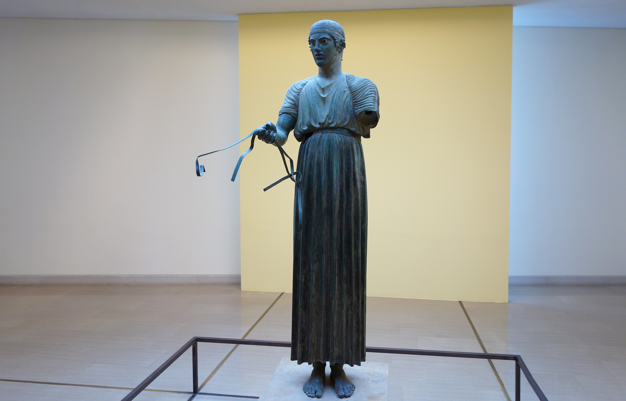 Charioteer of Delphi, c. 478-474 B.C.E., bronze (lost wax cast) with silver, glass and copper inlay, 1.8 m high (Delphi Archaeological Museum)