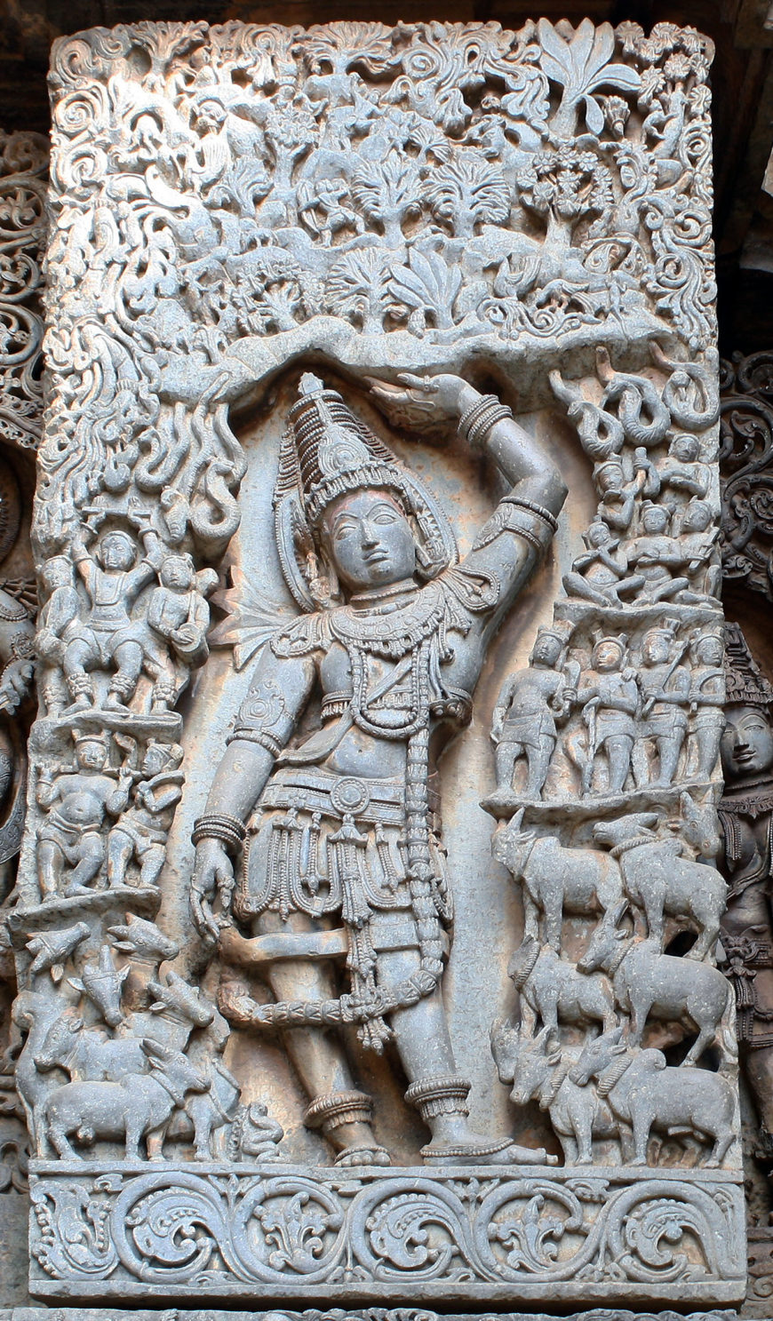 Krishna lifting Mount Govardhana, figural block from the Hoysaleshvara temple 