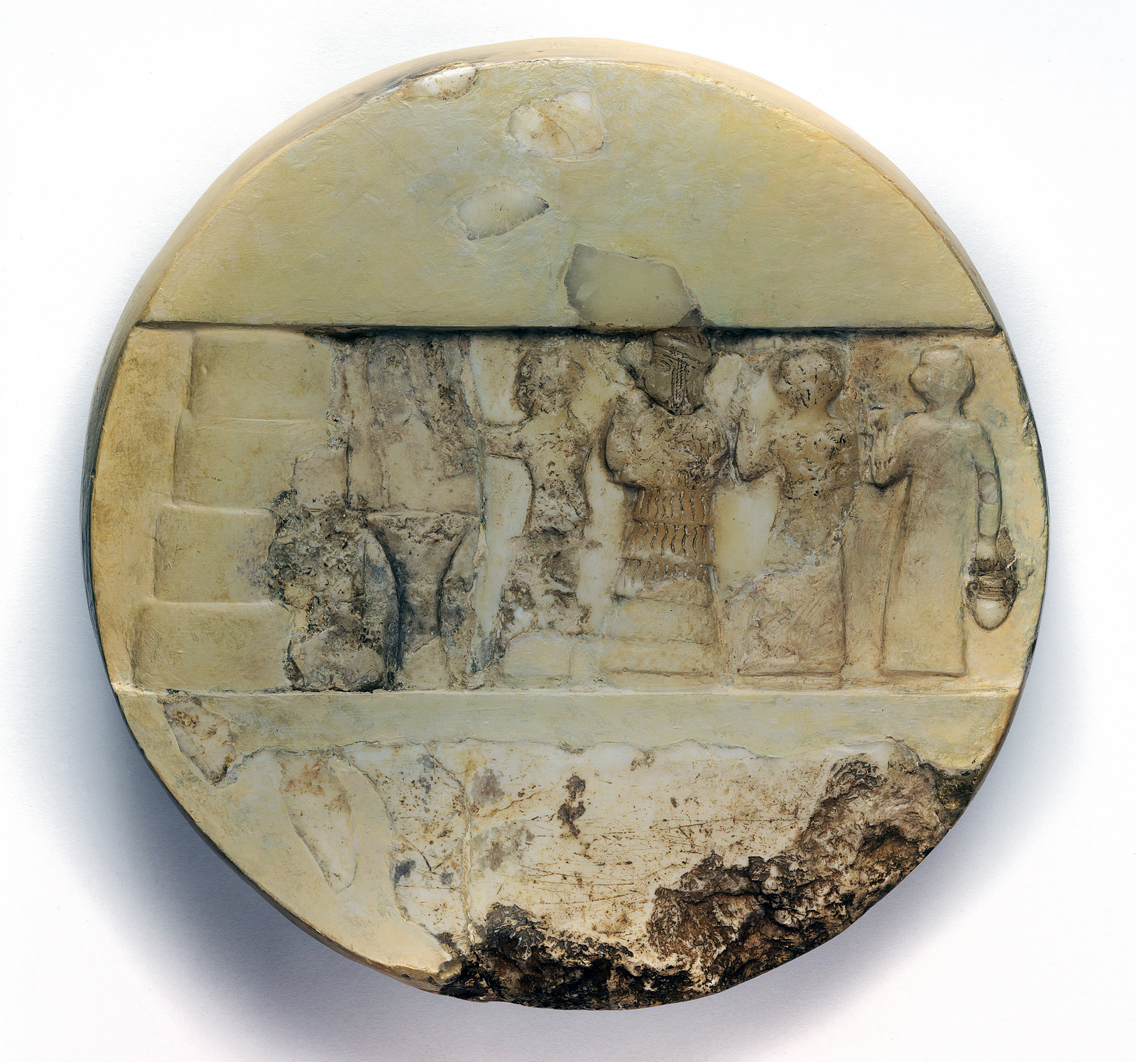 Relief of Enheduanna, Old Akkadian Period, c. 2340–2200 B.C.E., limestone and calcite, 25 cm diameter, from Ur, Iraq, found in a chamber of the Larsa temple of Nin-Gal (the Gig-par-ku) (Penn Museum)
