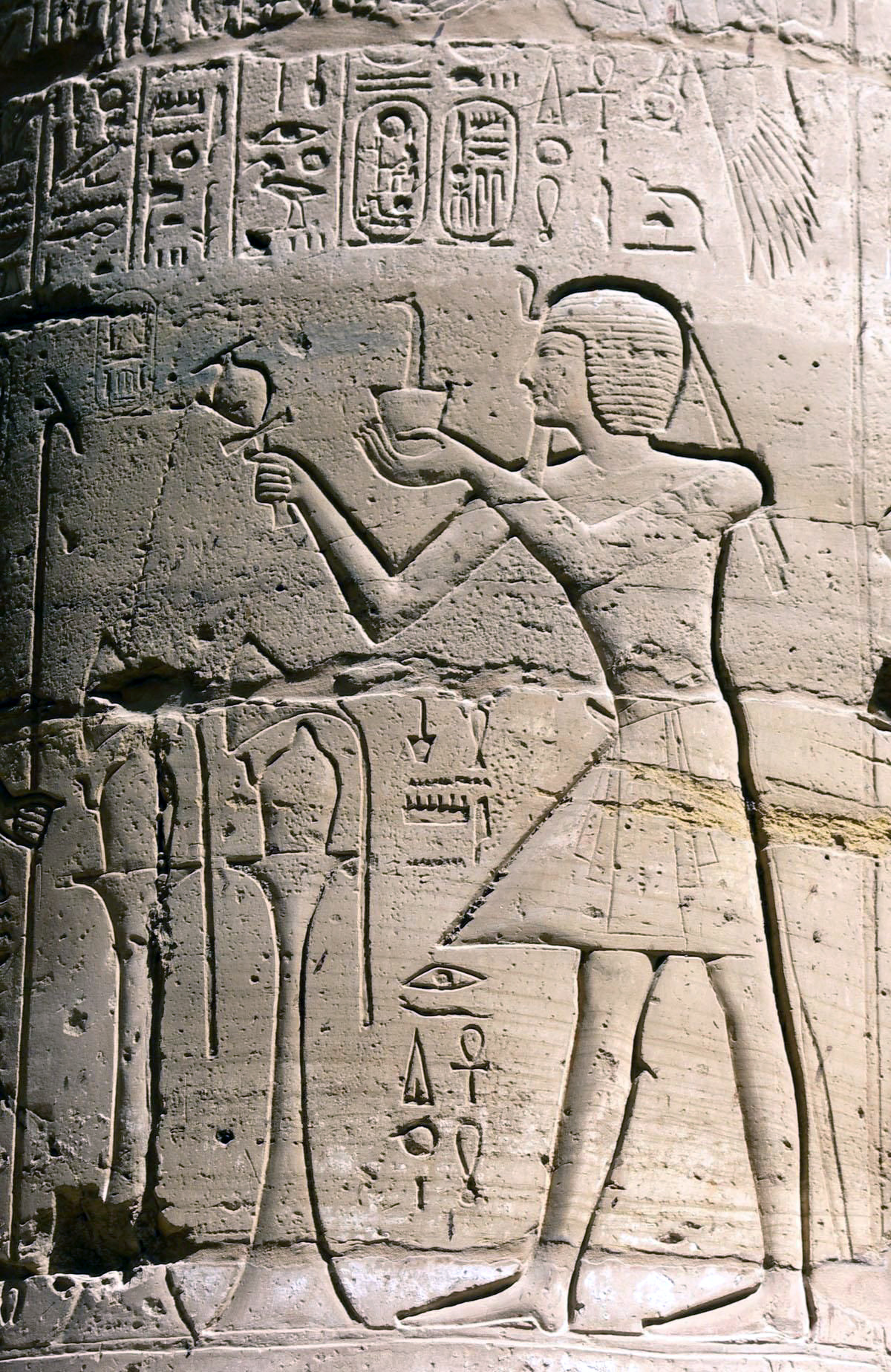 Column scene of Ramesses II burning incense and pouring libation, in the Hypostyle Hall, Karnak, Thebes