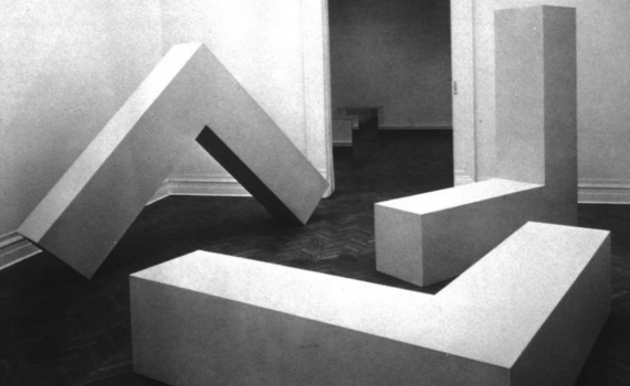 Robert Morris, Untitled (L-Beams), 1965, originally plywood, later versions made in fiberglass and stainless steel, 8 x 8 x 2'