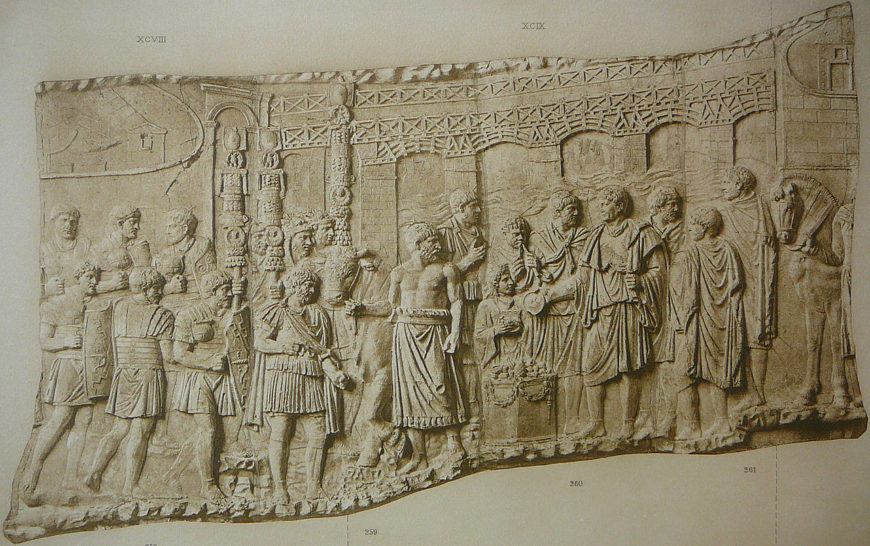 Relief from the Column of Trajan, Carrara marble, completed 113 C.E., showing the bridge in the background and in the foreground Trajan is shown sacrificing by the Danube river (photo: Gun Powder Ma, public domain)