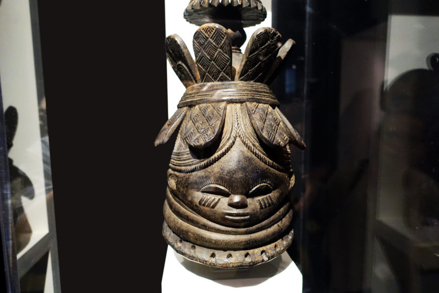 Bundu or Sowei Helmet Mask (Ndoli Jowei), Mende, Nguabu Master (Moyamba district, Sierra Leone), late 19th-early 20th century, wood and pigment, 39.4 x 23.5 x 26 cm (Brooklyn Museum)