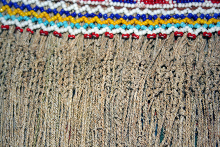 Detail of a thethana with knotted strands of tsikitlane. Photo by David M. M. Riep