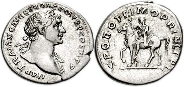 Silver coin, Denarius (19mm, 3.35 g, 7h), struck 112–114/115 C.E IMP TRAIANO AVG GER DAC P M TR P COS VI P P, laureate bust right, drapery on far shoulder S P Q R OPTIMO PRINCIPI, equestrian statue of Trajan facing left, holding spear and sword (or small Victory) (image: Cristiano64, CC BY-SA 2.5)