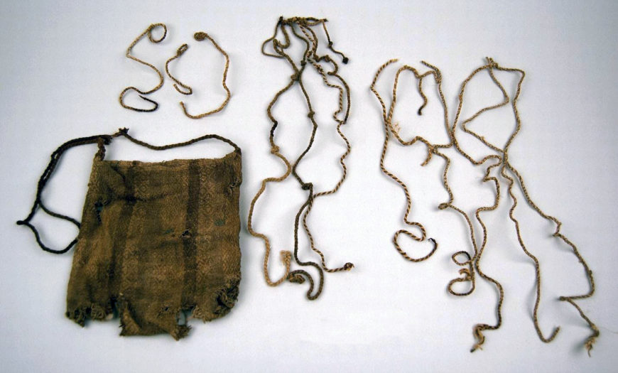 A woven Inka bag, inside which was found a fragmented khipu and loose pendant strings. This bag and its contents were recovered near modern Lima, Peru, as part of a group of mortuary goods likely belonging to an Inka bureaucrat. Catalog number 1194, Logan Museum of Anthropology, Beloit College.