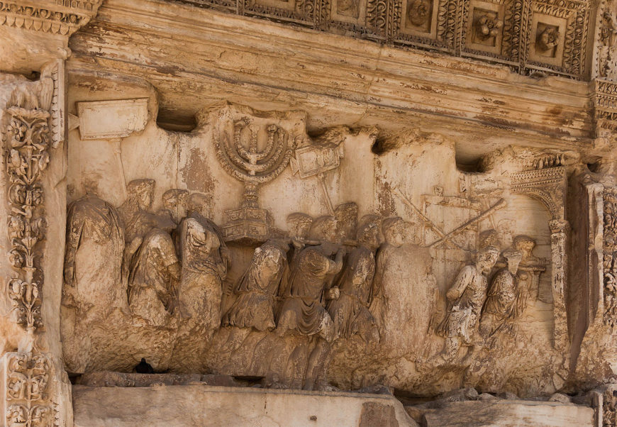 Relief depicting a triumphal procession into Rome with loot from the temple, including the menorah, panel in the passageway, Arch of Titus, Rome, c. 81 C.E., marble, 6’–7” high (photo: Jebulon, CC0 1.0). While the Hebrew Bible is Judaism’s most sacred text, many of the laws it delineates concern the practice of Temple sacrifice and priestly behavior. But when the Roman Emperor Titus sacked Jerusalem in response to a revolt of the Israelites in 70 C.E., his armies demolished the Temple of Jerusalem and brought the spoils back to Rome (an event recorded in a relief on the Arch of Titus in Rome, see image above). The loss of the Temple resulted in the end of ritual sacrifice and the priesthood; Judaism became a religion based on the interpretive discussions and practices that were eventually compiled into the Talmud. Sometimes, Judaism is referred to as “rabbinic Judaism,” since centuries of rabbinic interpretation, rather than the Bible, informs Jewish practice