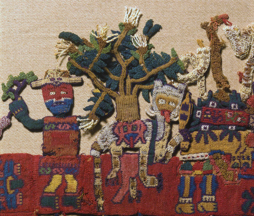 Pampas cat and tree, border figure 3, Nasca, Mantle ("The Paracas Textile"), 100–300 C.E., cotton, camelid fiber, 58–1/4 x 24–1/2" / 148 x 62.2 cm, found south coast, Paracas, Peru (Brooklyn Museum)
