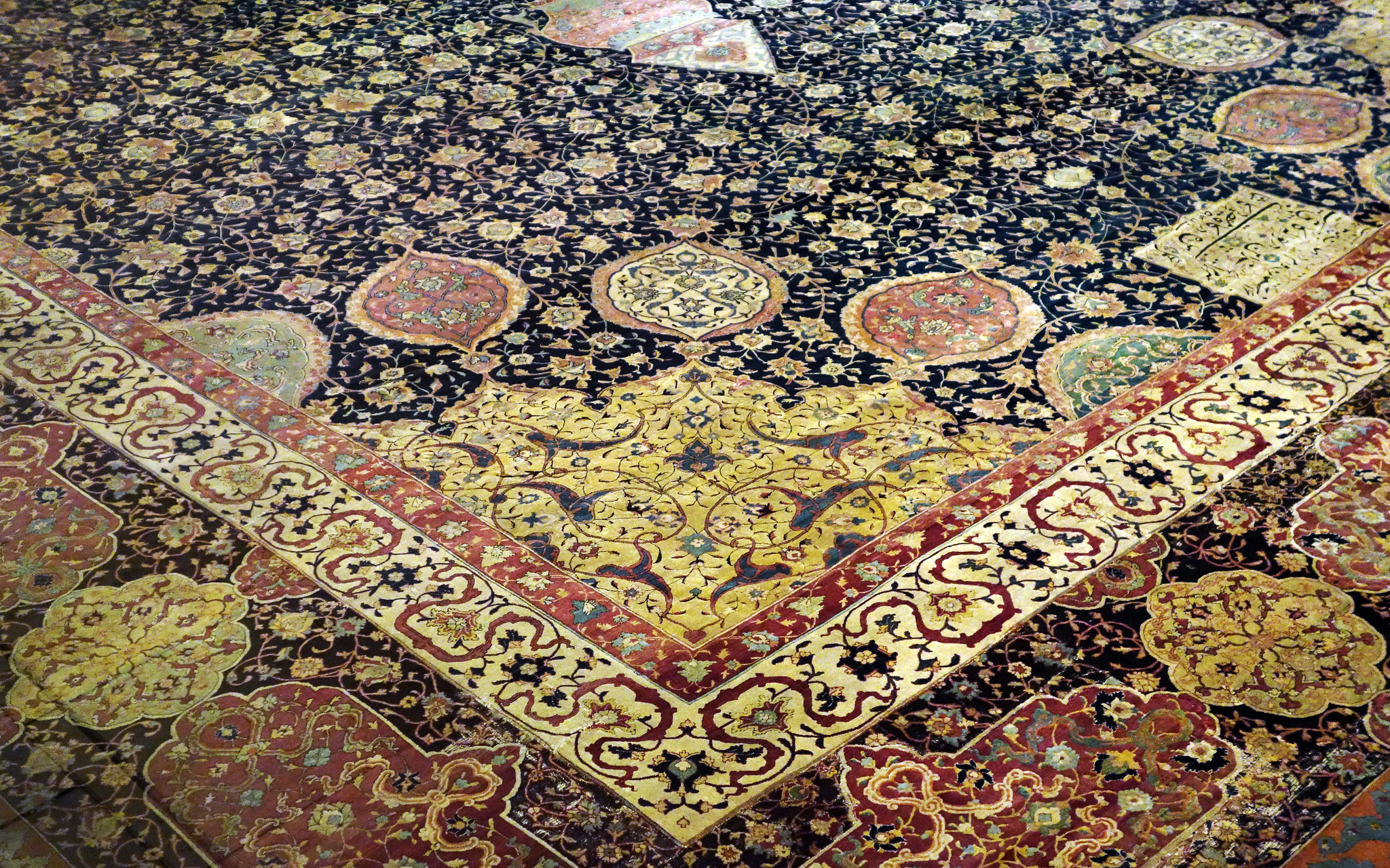 Medallion Carpet, The Ardabil Carpet (detail of corner), Unknown artist (Maqsud Kashani is named on the carpet’s inscription), Persian: Safavid Dynasty, silk warps and wefts with wool pile (25 million knots, 340 per sq. inch), 1539-40 C.E., Tabriz, Kashan, Isfahan or Kirman, Iran (Victoria and Albert Museum) (photo: Steven Zucker, CC BY-NC-SA 2.0)