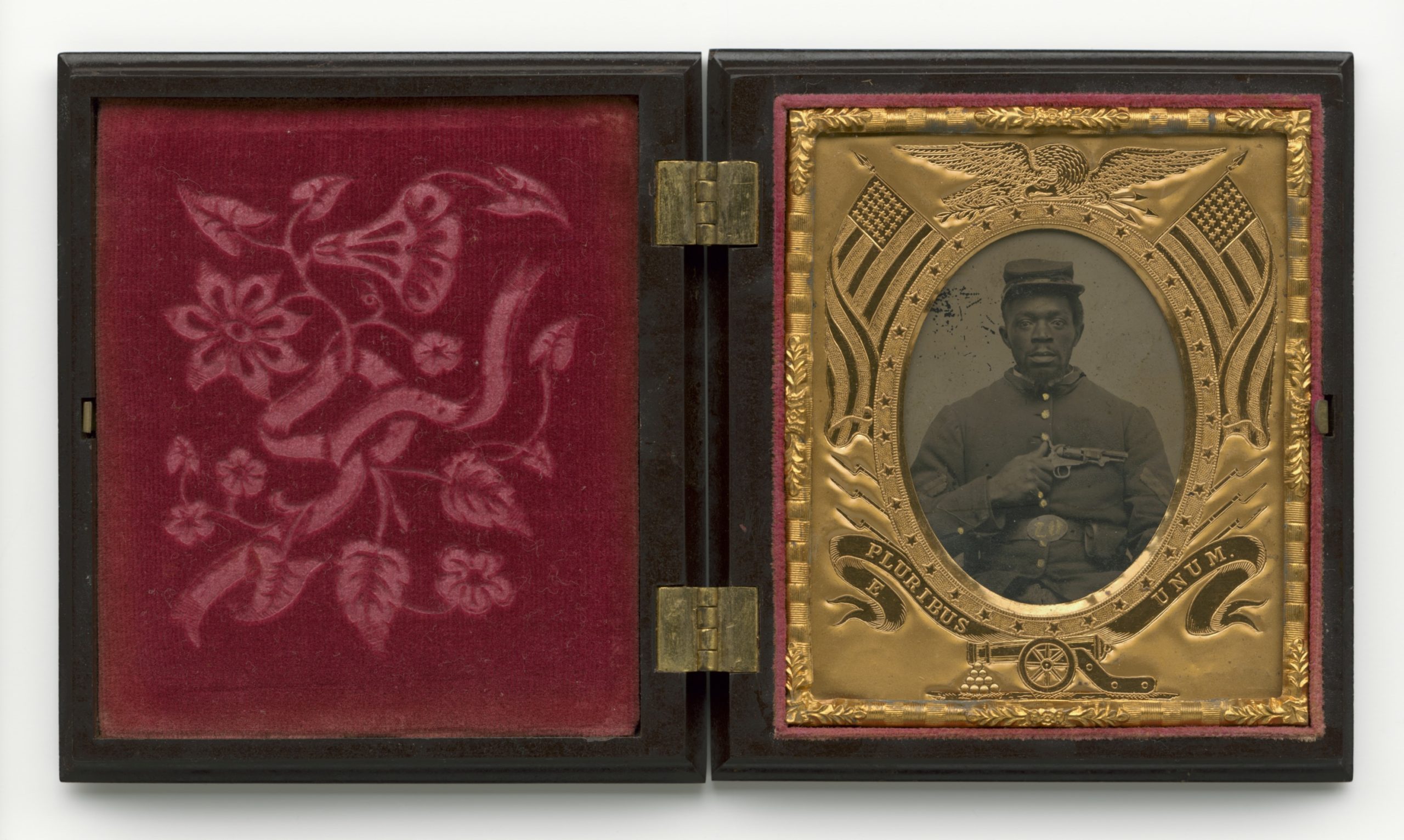 Hand-colored tintype with cover glass of an unknown Black U.S. soldier, in black thermoplastic case with brass hinges and red velvet liner, c. 1861-65 (Smithsonian National Museum of African American History and Culture)