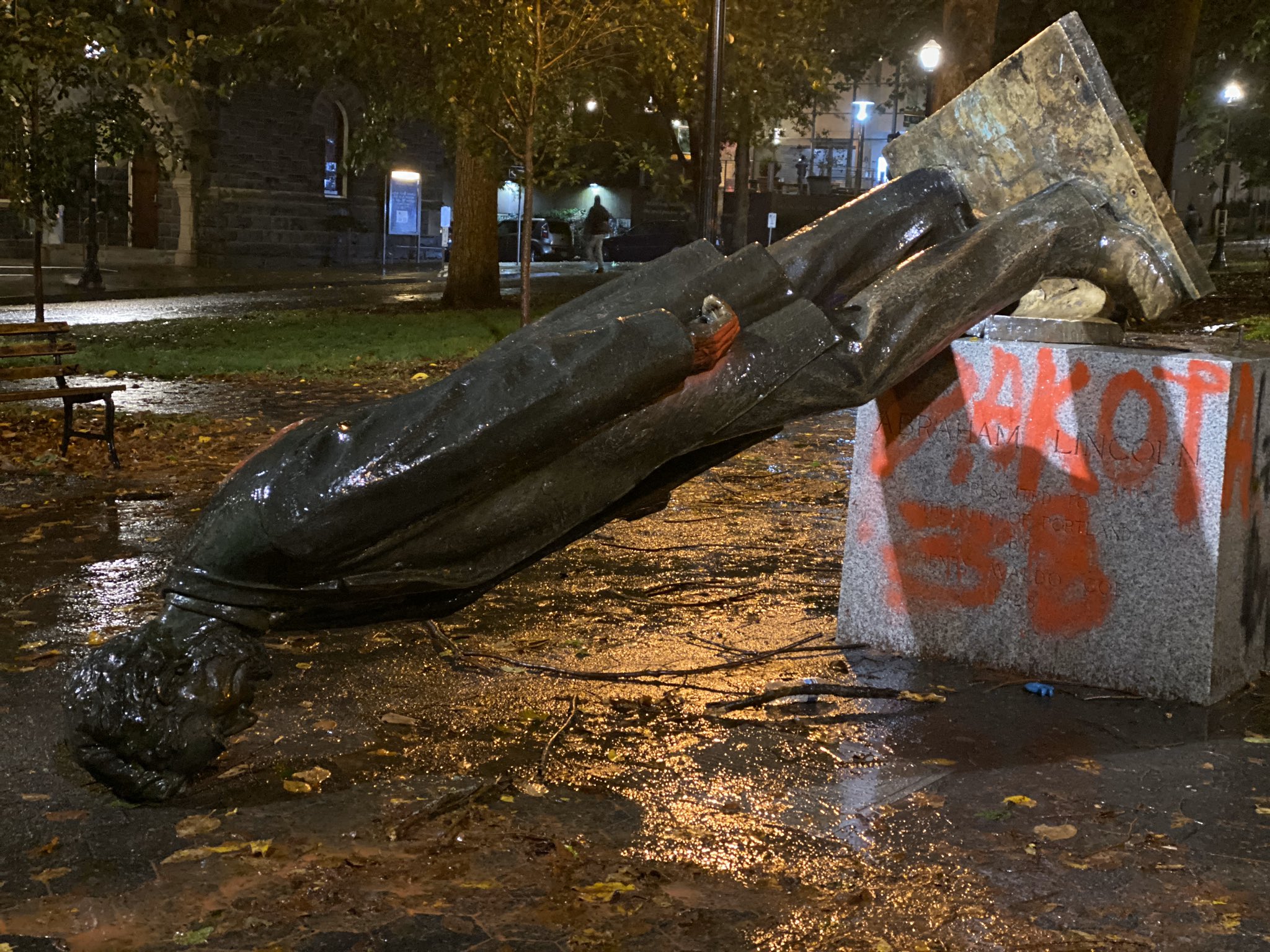 Statue of Abraham Lincoln in Portland, Oregon, toppled during the Indigenous Peoples Day of Rage on October 11, 2020. George Fite Waters, Abraham Lincoln, 1927, bronze, 10 feet high, photo © Sergio Olmos