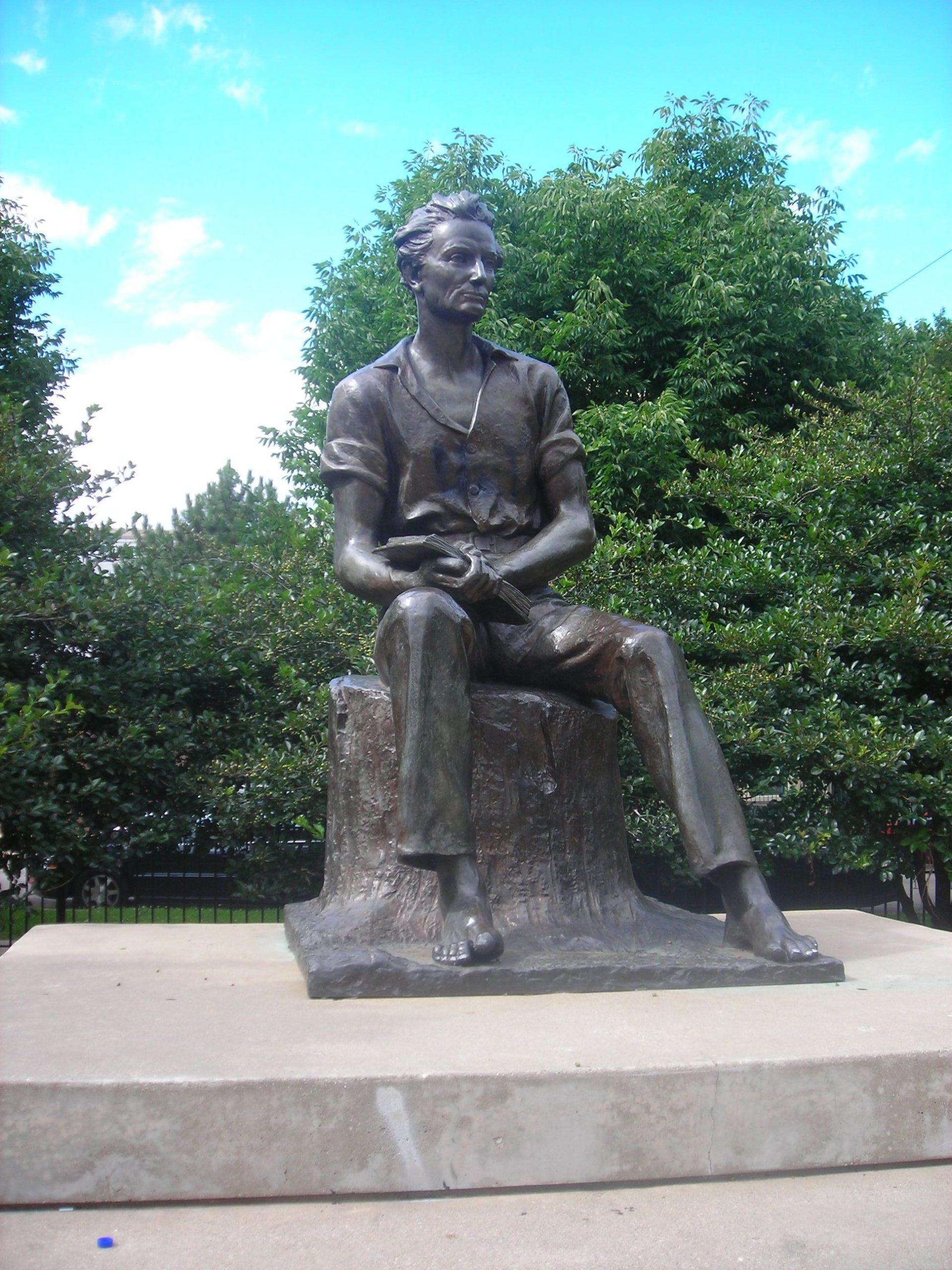 Charles Keck, <em>The Young Lincoln</em>, c. 1945, bronze sculpture on a concrete base, 12 x 8 x 8 feet (on loan to the Chicago Park District from the Chicago Public Library)