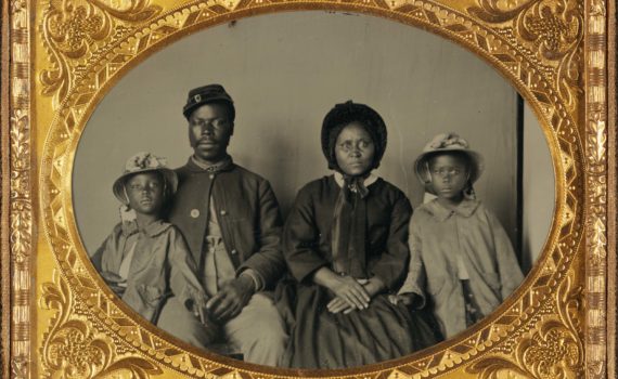 Unidentified African American soldier in U.S. Army uniform with wife and two daughters, c. 1863–65, ambrotype, 13.9 x 16.4 cm (frame), (Library of Congress)