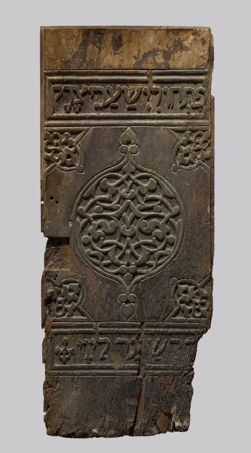 Panel from a Torah Shrine from the Ben Ezra Synagogue in Cairo, 11th century, wood (walnut) with traces of paint and gilt, 87.3 x 36.7 cm (The Walters Art Museum). The patterns of vine scrolls and lozenges shows the influence of Islamic art.