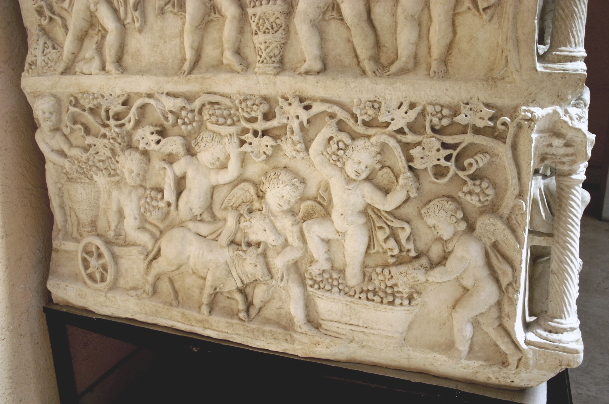 Erotes harvesting grapes (detail), plaster copy of Sarcophagus of Junius Bassus, original is 359 C.E., marble (Treasury, St. Peter's Basilica, Vatican City; photo: Giovanni Dall'Orto)