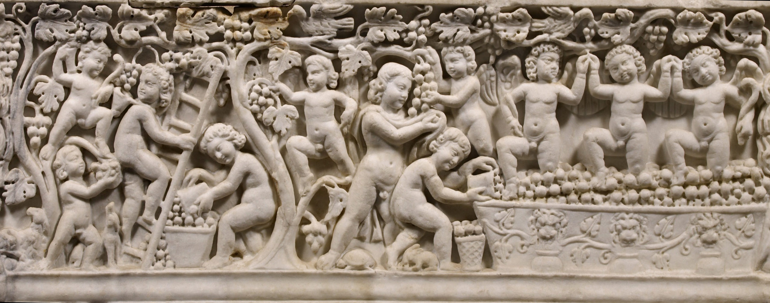 Erotes harvesting grapes (detail), Sarcophagus representing a Dionysiac Vintage Festival, 290–300 C.E., marble (Getty, Los Angeles)