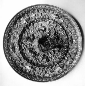 Mirror with birds and beasts amid grape vines, 7th–8th century (Tang dynasty), bronze, China, 17.1 cm in diameter (The Metropolitan Museum of Art)