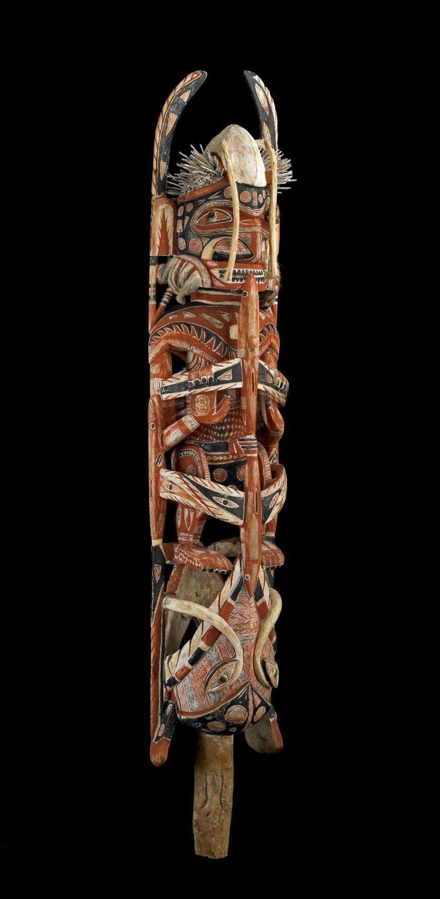 Malangan figure, 1882–83 C.E., wood, vegetable fiber, pigment, and shell (turbo petholatus opercula), 122 cm high, north coast of New Ireland, Papua New Guinea (© Trustees of the British Museum)