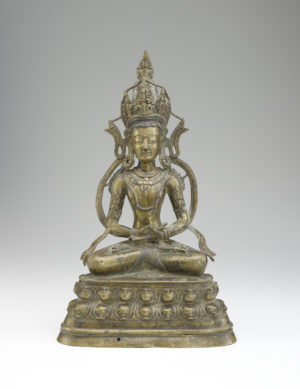 Figure of a seated bodhisattva, 14th century, Tibet, brass with silver and copper inlay, 36.5 x 23 x 11 cm (National Museum of Asian Art)