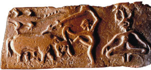 Molded tablet, Harappa, terracotta, 3.81 cm long (Harappa Museum)