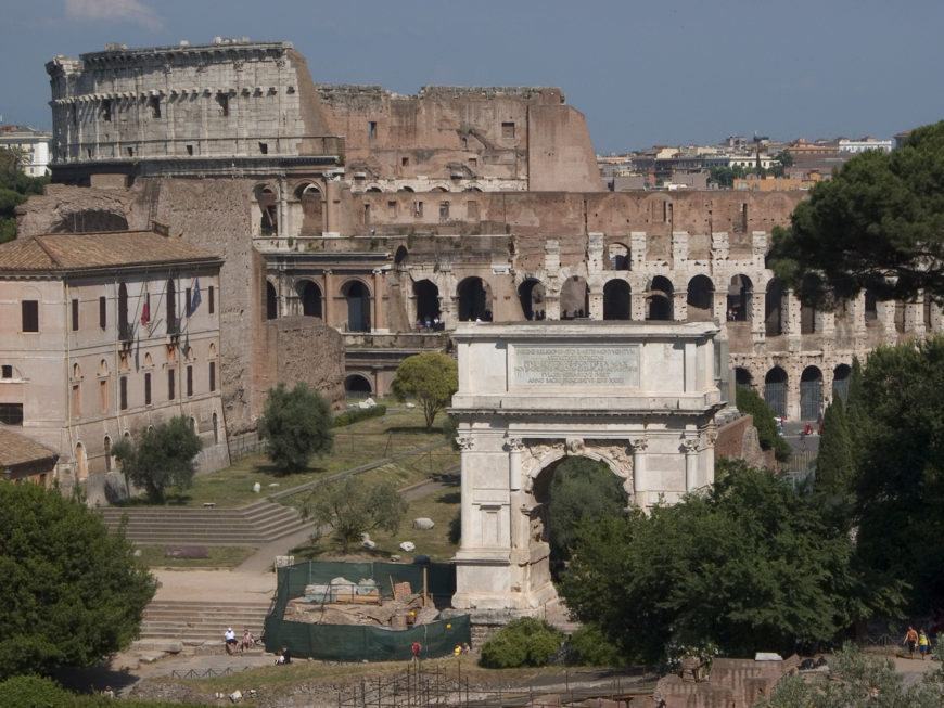 Arch of Titus (foreground) with the Colosseum in the background (photo: Steven Zucker, CC BY-NC-SA 2.0)