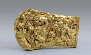 Belt Buckle with Granulation, c. 1st century B.C.E.–1st century C.E., Han dynasty, gold inlaid with semiprecious stones, China (Xinjiang Uygur Autonomous Region Museum, lent to The Metropolitan Museum of Art)