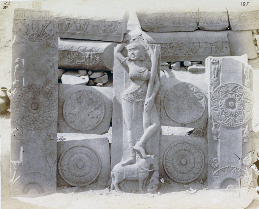 Joseph Beglar David, Sculpture pieces excavated from the Stupa at Bharhut, part of south-west quadrant: railing fragments and a female figure, 1874, photography (British Library)